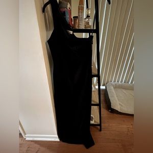 Black, never used, WITH TAG, one shoulder Calvin Klein dress.